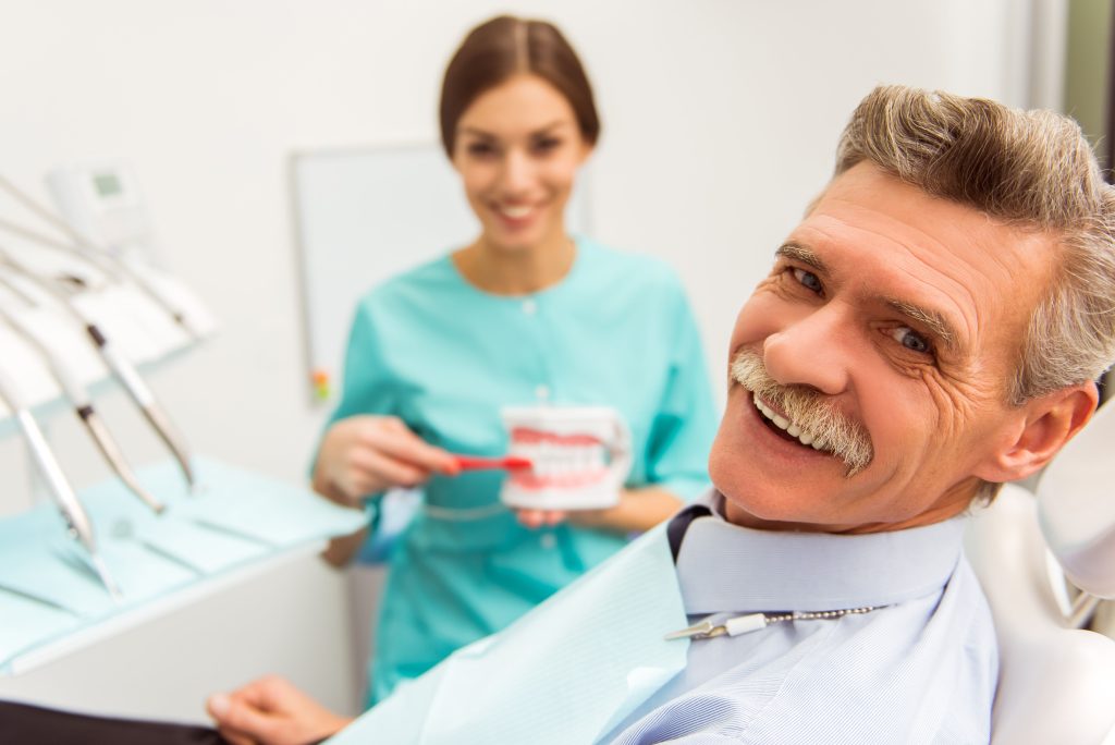 happy man with dental implants