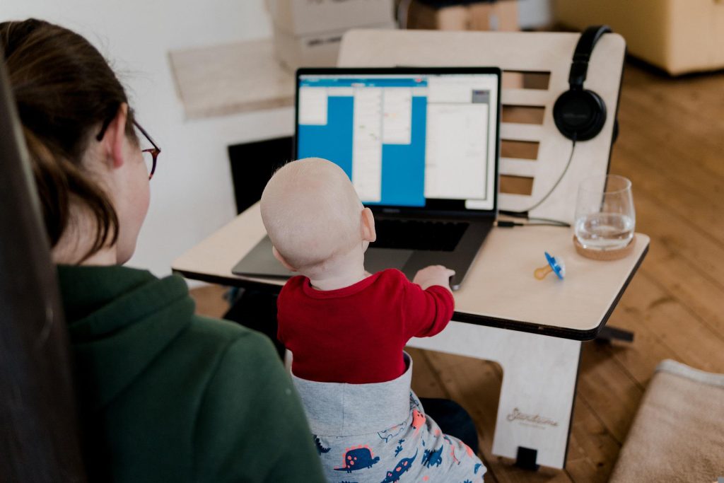 mom working from home with her baby