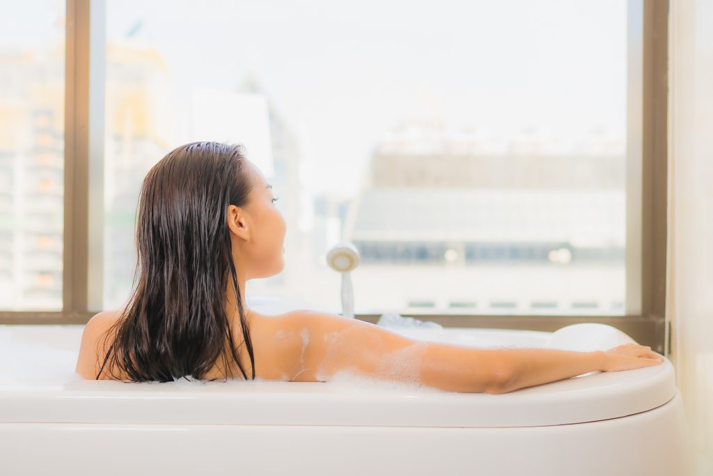 woman relaxing in the bath tub